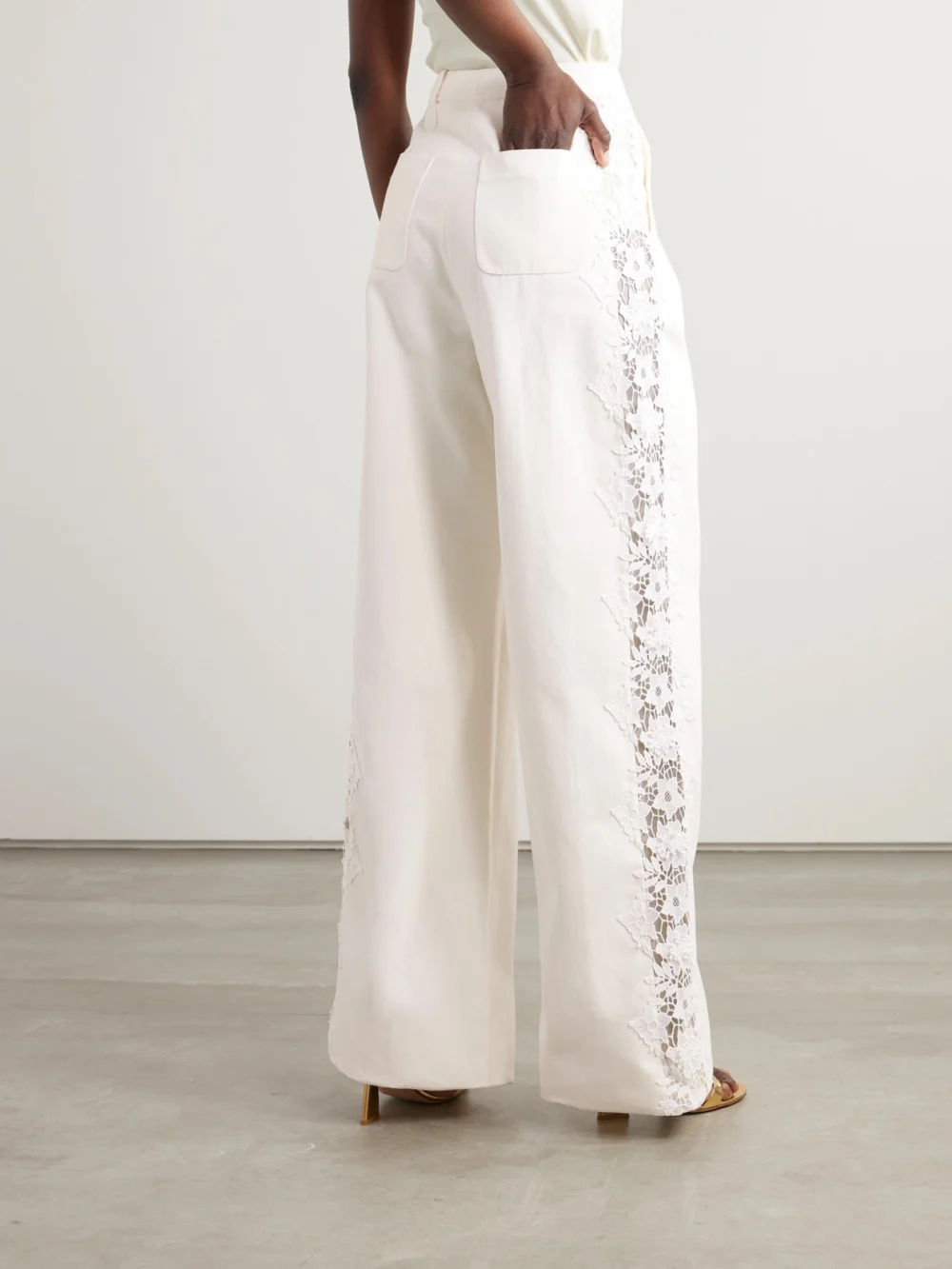 Back view of the Safiyaa Fredan Guipure Lace-trimmed Cotton-twill Wide-leg Pants