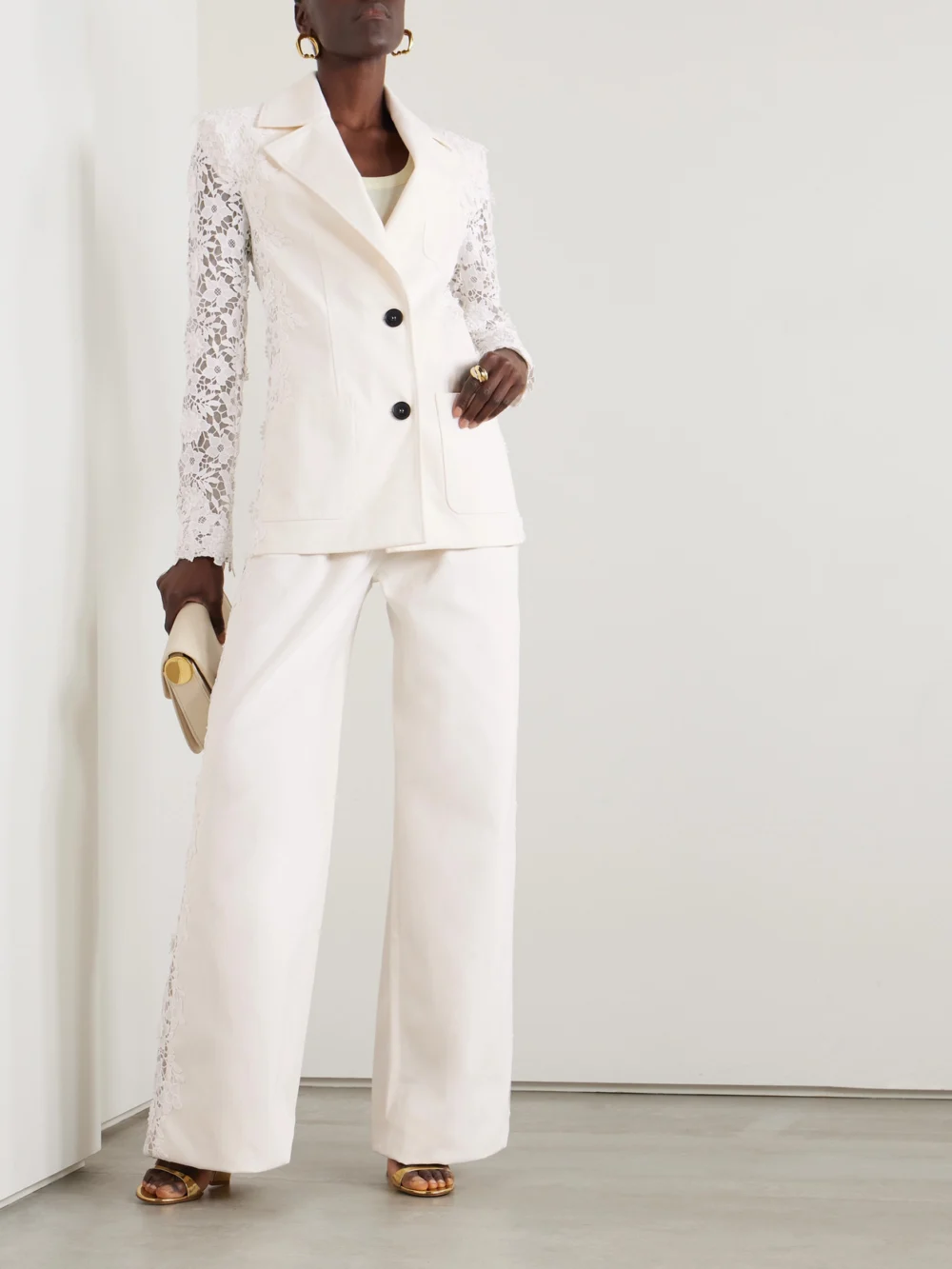 Safiyaa Fredan Guipure Lace-trimmed Cotton-twill Wide-leg Pants, worn by a model