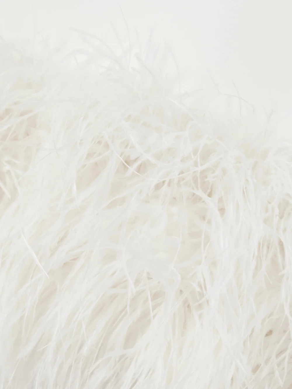 Close-up detail of the Safiyaa Goya Strapless Feather-trimmed Crepe Midi Dress
