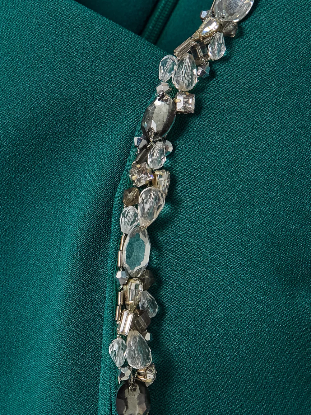 Close-up detail of the Safiyaa Jana Crystal-embellished Stretch-crepe Gown