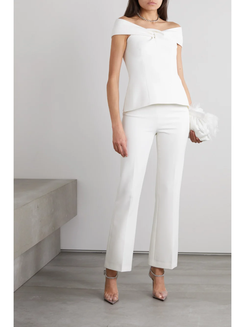 Safiyaa Mari Pleated Stretch-crepe Flared Pants, worn by a model