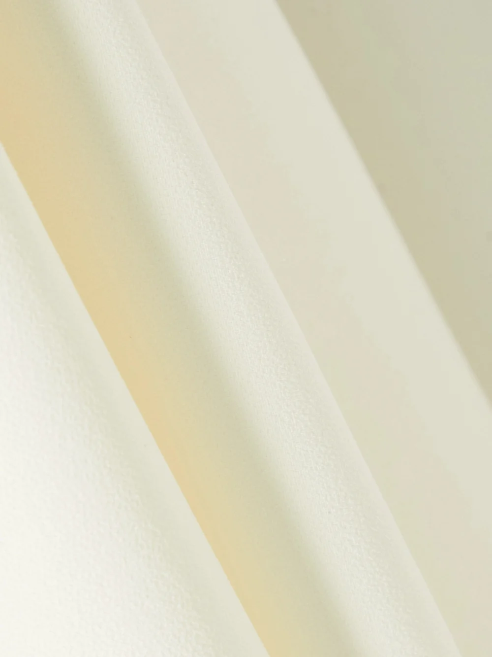 Close-up detail of the Safiyaa Zephyra One-shoulder Cape-effect Crepe Jumpsuit