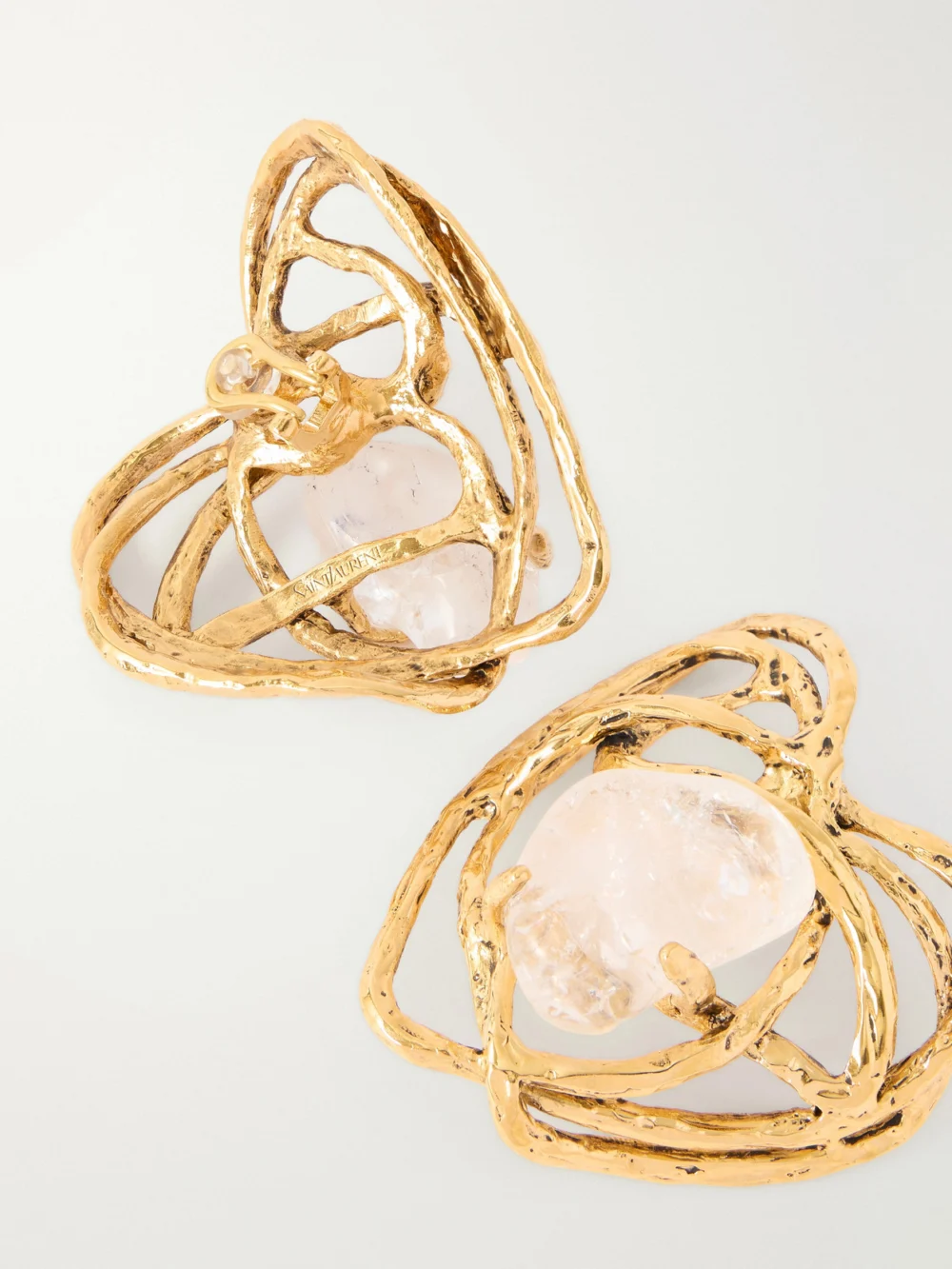 Close-up detail of the Saint Laurent Bo Coeur Gold-tone Quartz Earrings