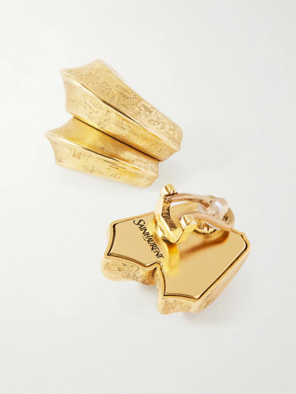 Close-up detail of the Saint Laurent Bo Pointes Arrondies Gold-tone Earrings