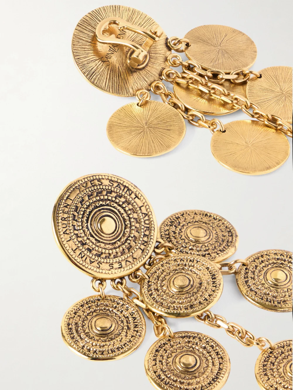 Close-up detail of the Saint Laurent Byzance Gold-tone Clip Earrings