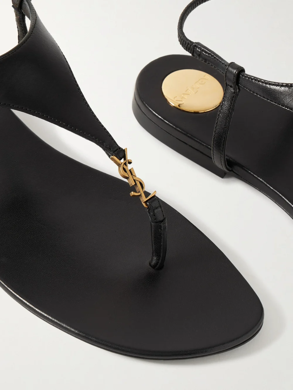Close-up detail of the Saint Laurent Cassandra Embellished Leather Sandals