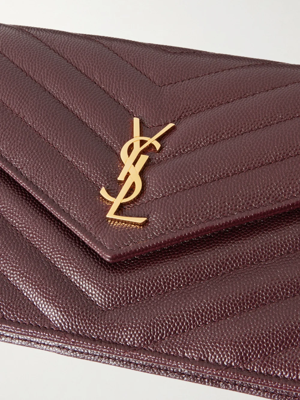 Close-up detail of the Saint Laurent Cassandre Envelope Chain Mini Matelassé Leather Wallet