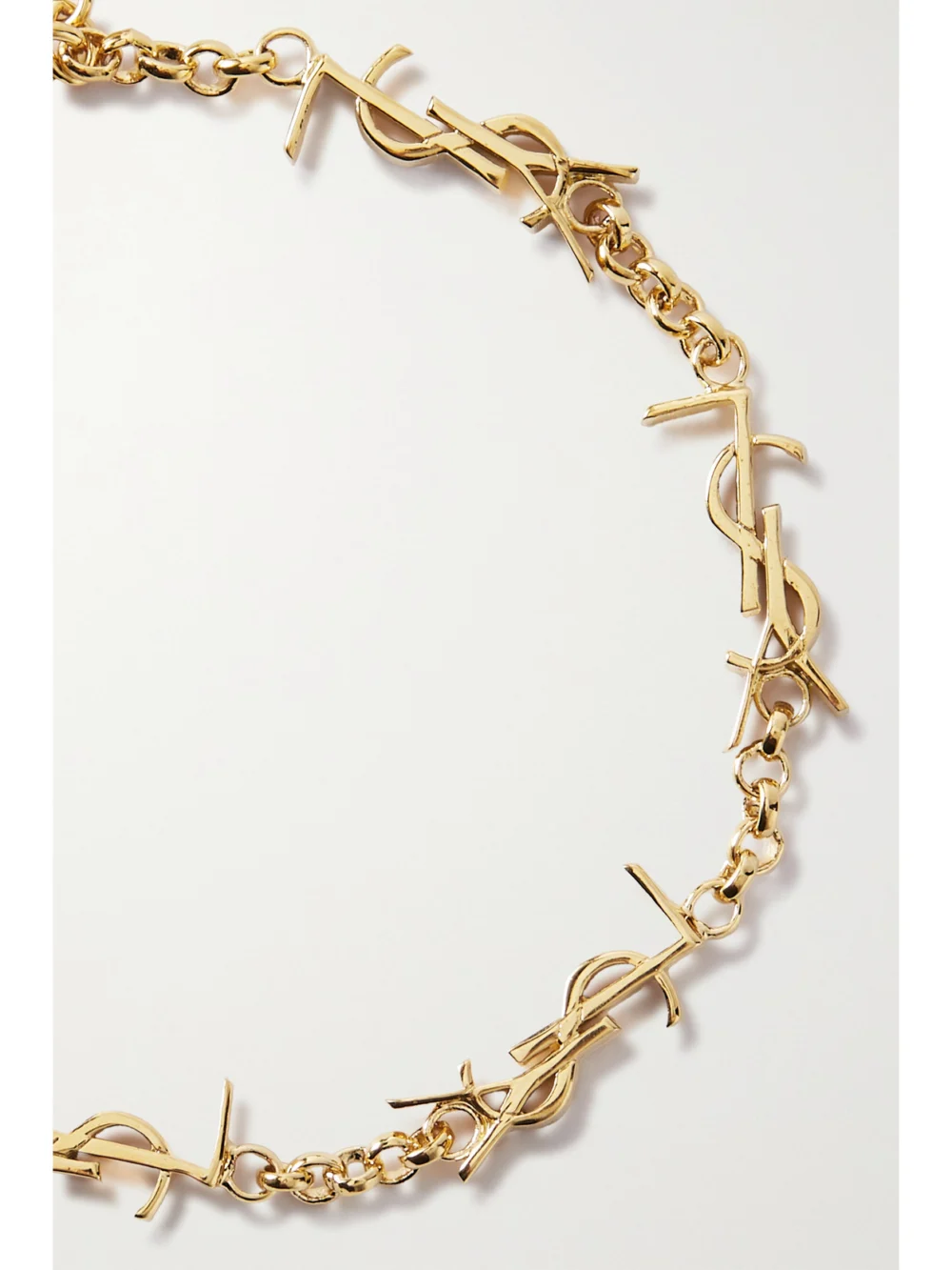 Close-up detail of the Saint Laurent Cassandre Gold-tone Bracelet