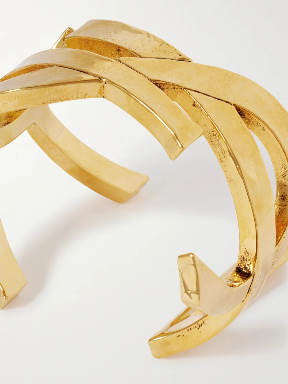 Close-up detail of the Saint Laurent Cassandre Gold-tone Cuff