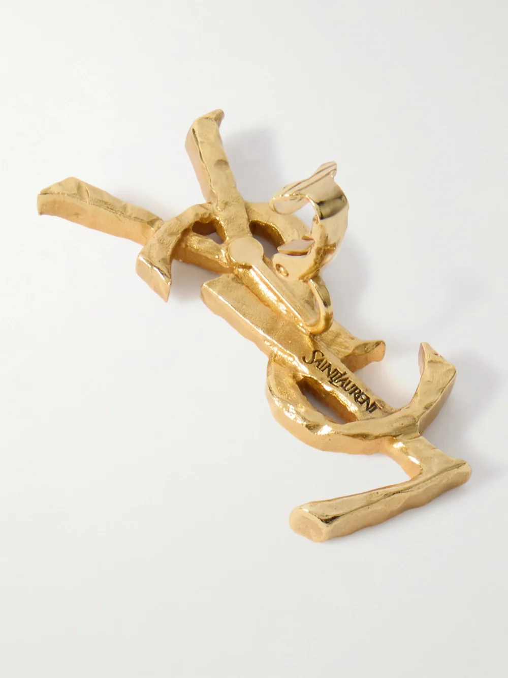 Back view of the Saint Laurent Cassandre Hammered Gold-tone Single Clip Earring