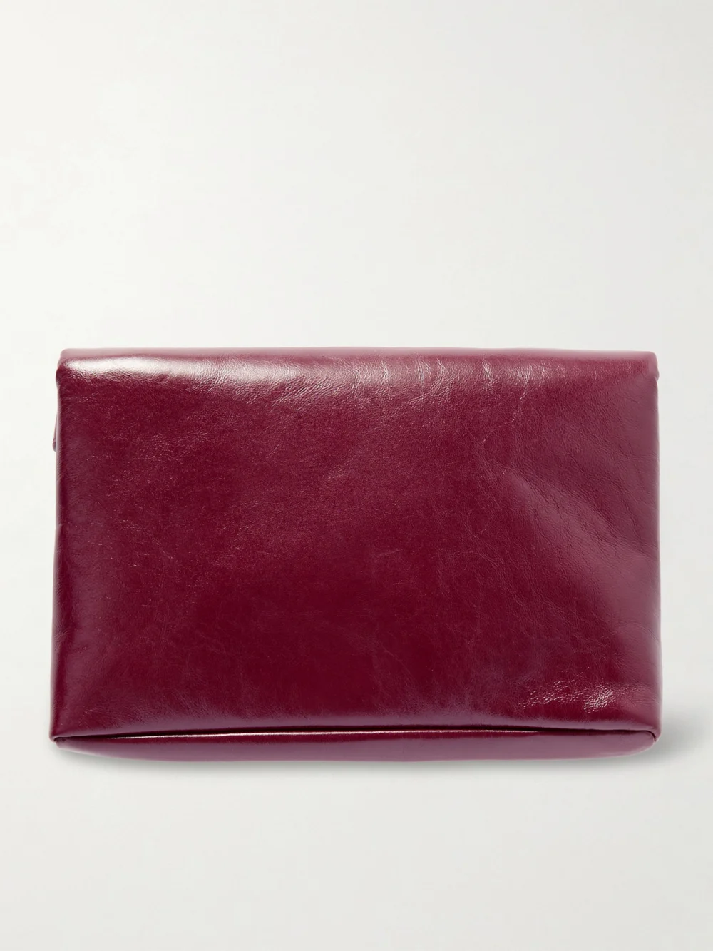 Back view of the Saint Laurent Cassandre Large Glossed-leather Clutch