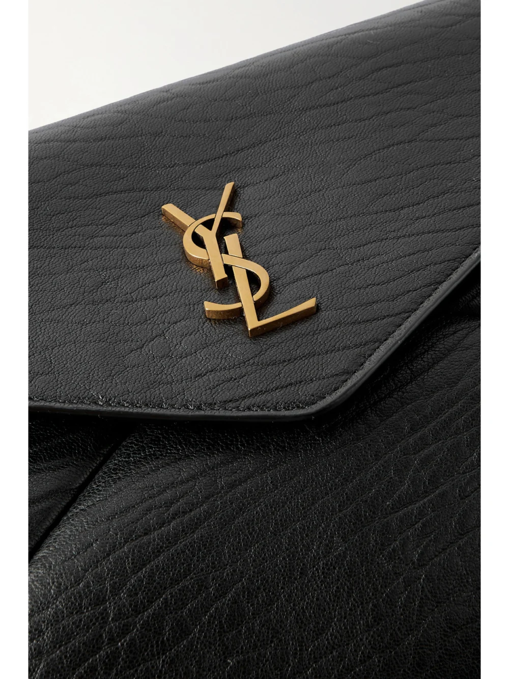 Close-up detail of the Saint Laurent Cassandre Large Textured-leather Clutch