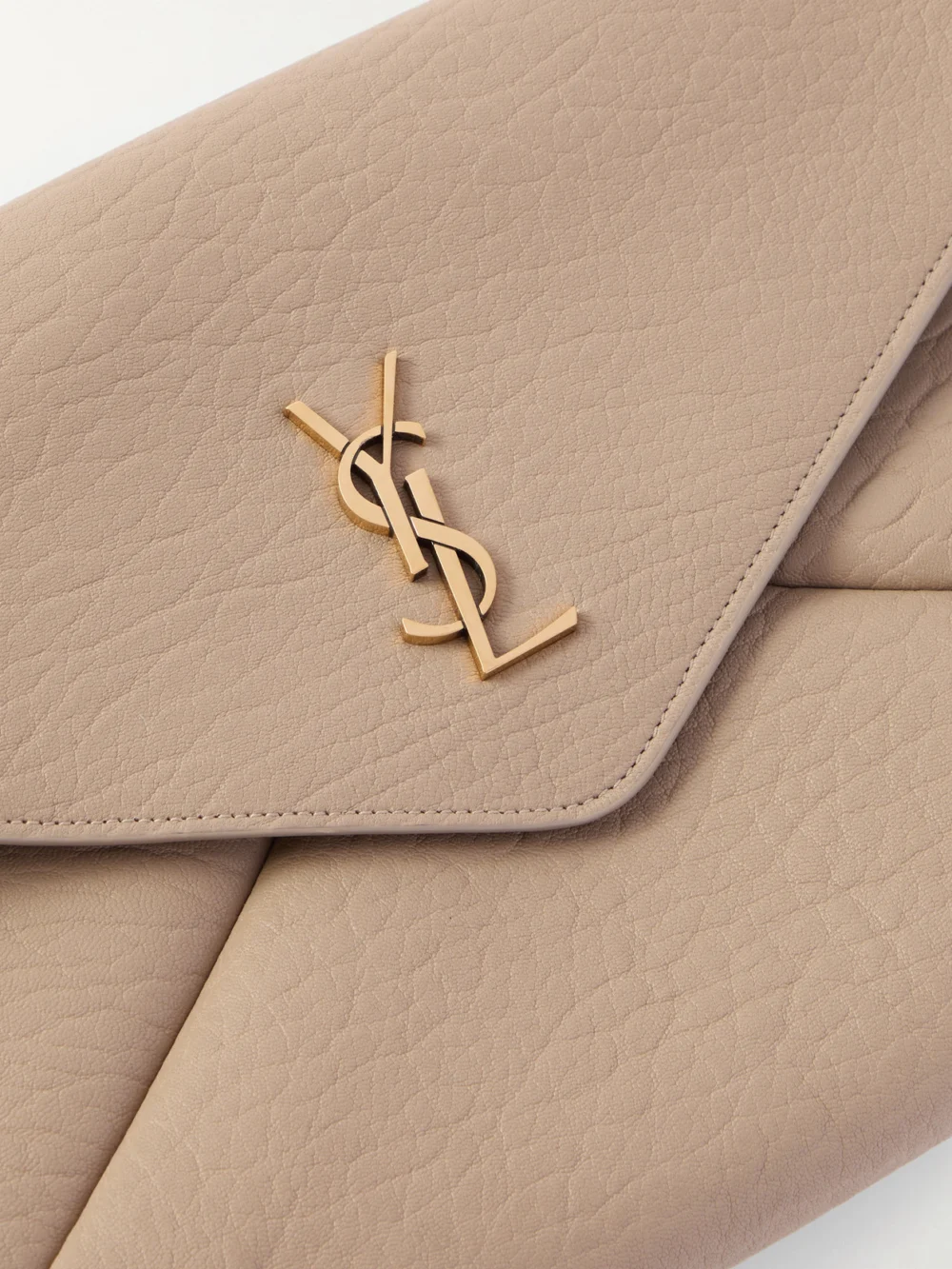 Close-up detail of the Saint Laurent Cassandre Large Textured-leather Clutch