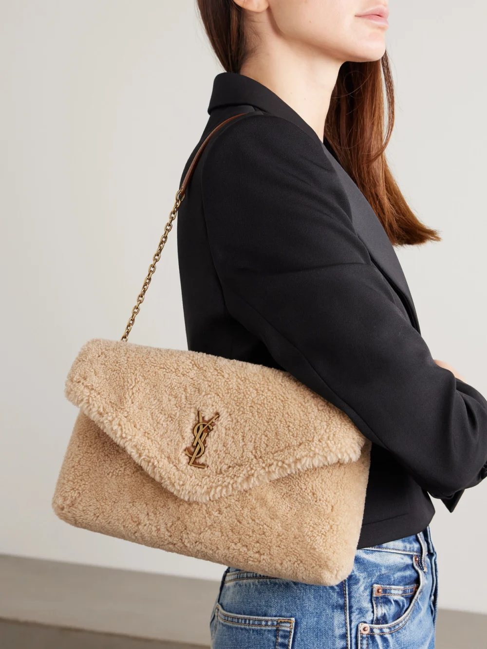 Saint Laurent Cassandre Leather-trimmed Shearling Shoulder Bag, styled view