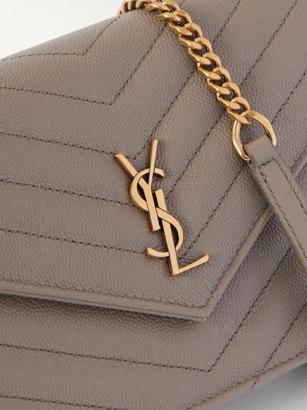 Close-up detail of the Saint Laurent Cassandre Matelassé Textured-leather Shoulder Bag