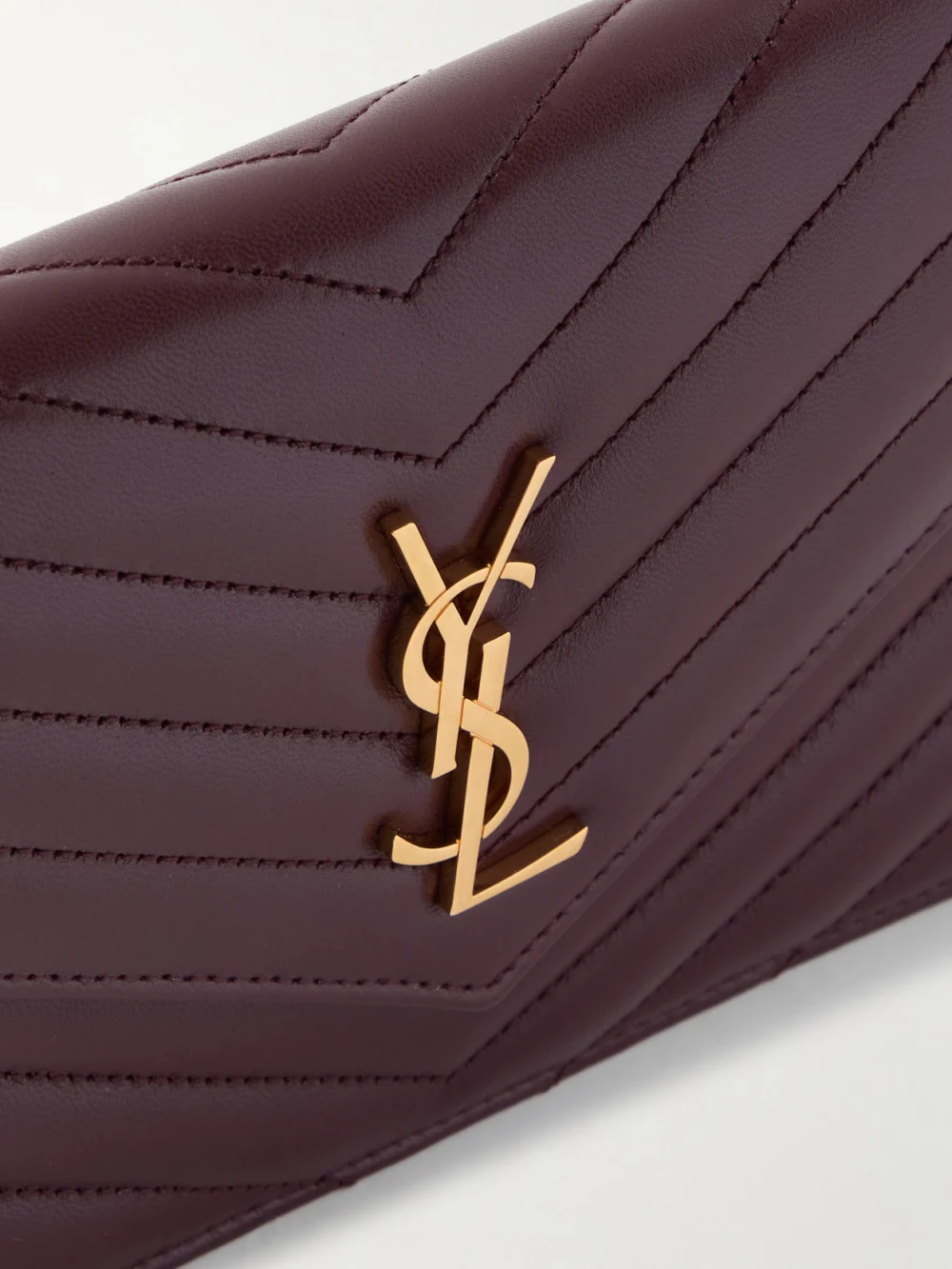 Close-up detail of the Saint Laurent Cassandre Mini Matelassé Leather Chain Wallet