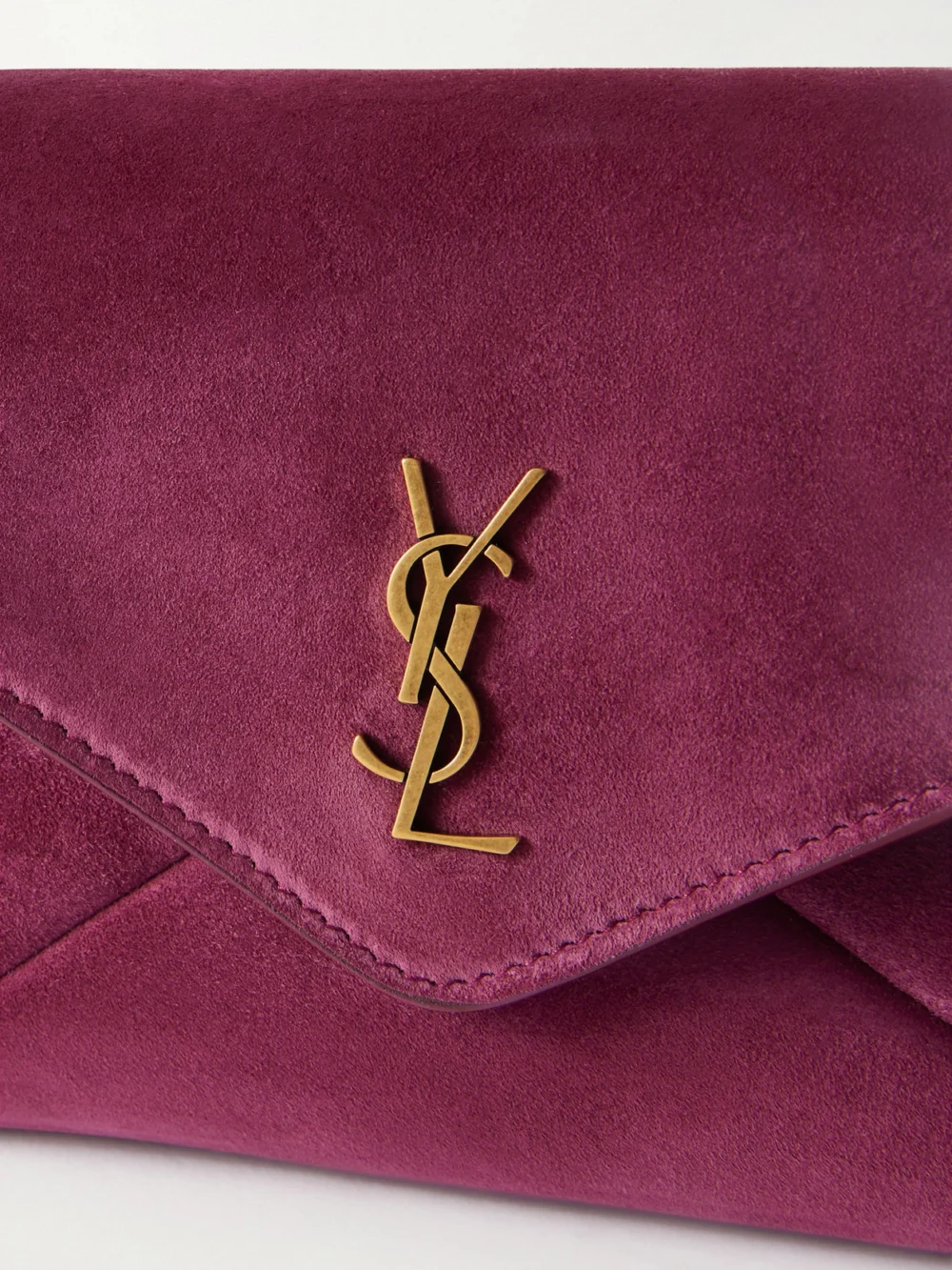 Close-up detail of the Saint Laurent Cassandre Suede Shoulder Bag