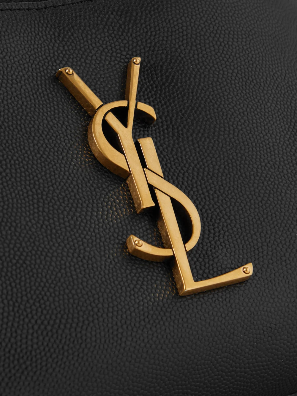 Close-up detail of the Saint Laurent Cassandre Textured-leather Belt Bag