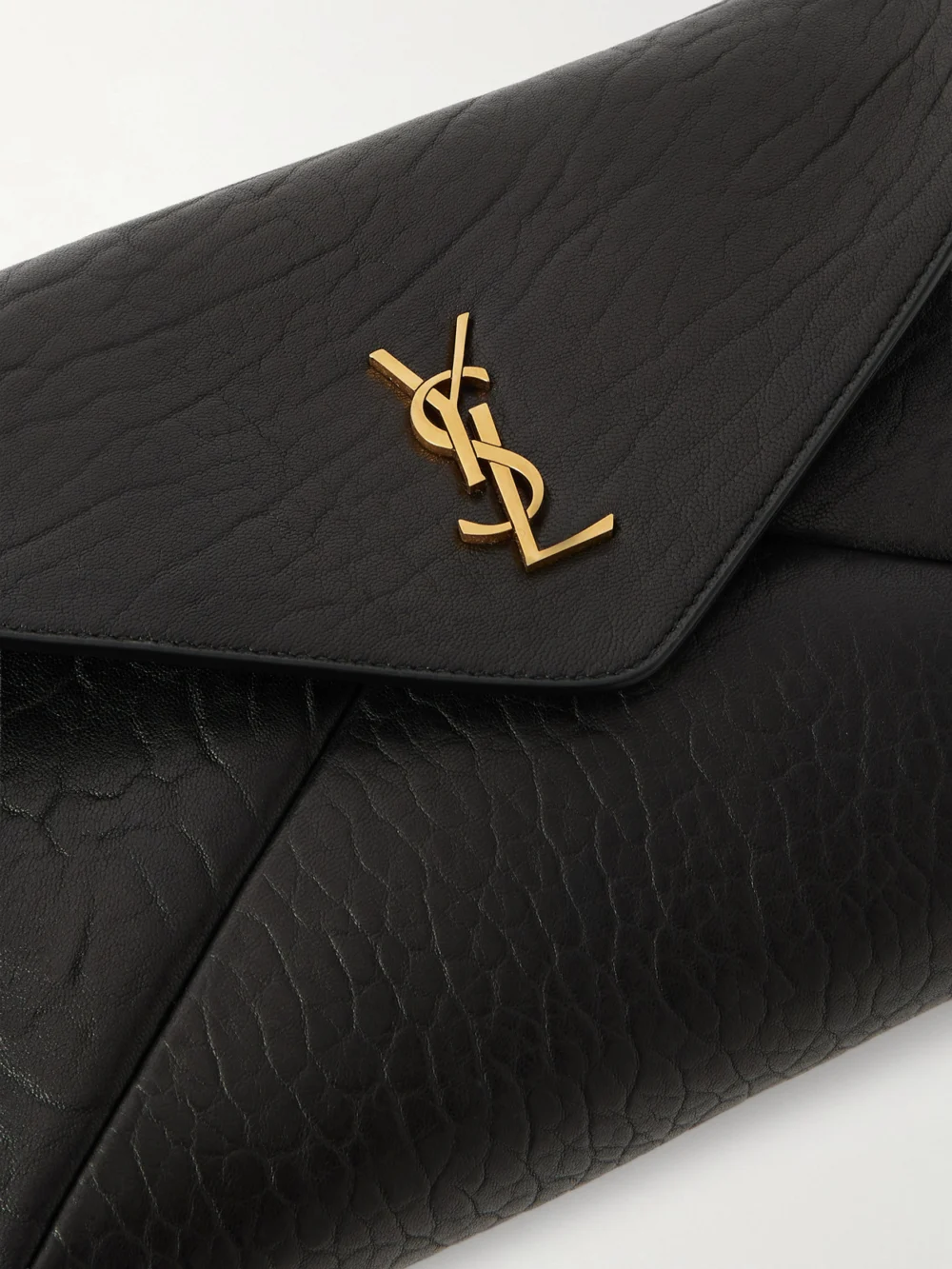Close-up detail of the Saint Laurent Cassandre Textured-leather Shoulder Bag