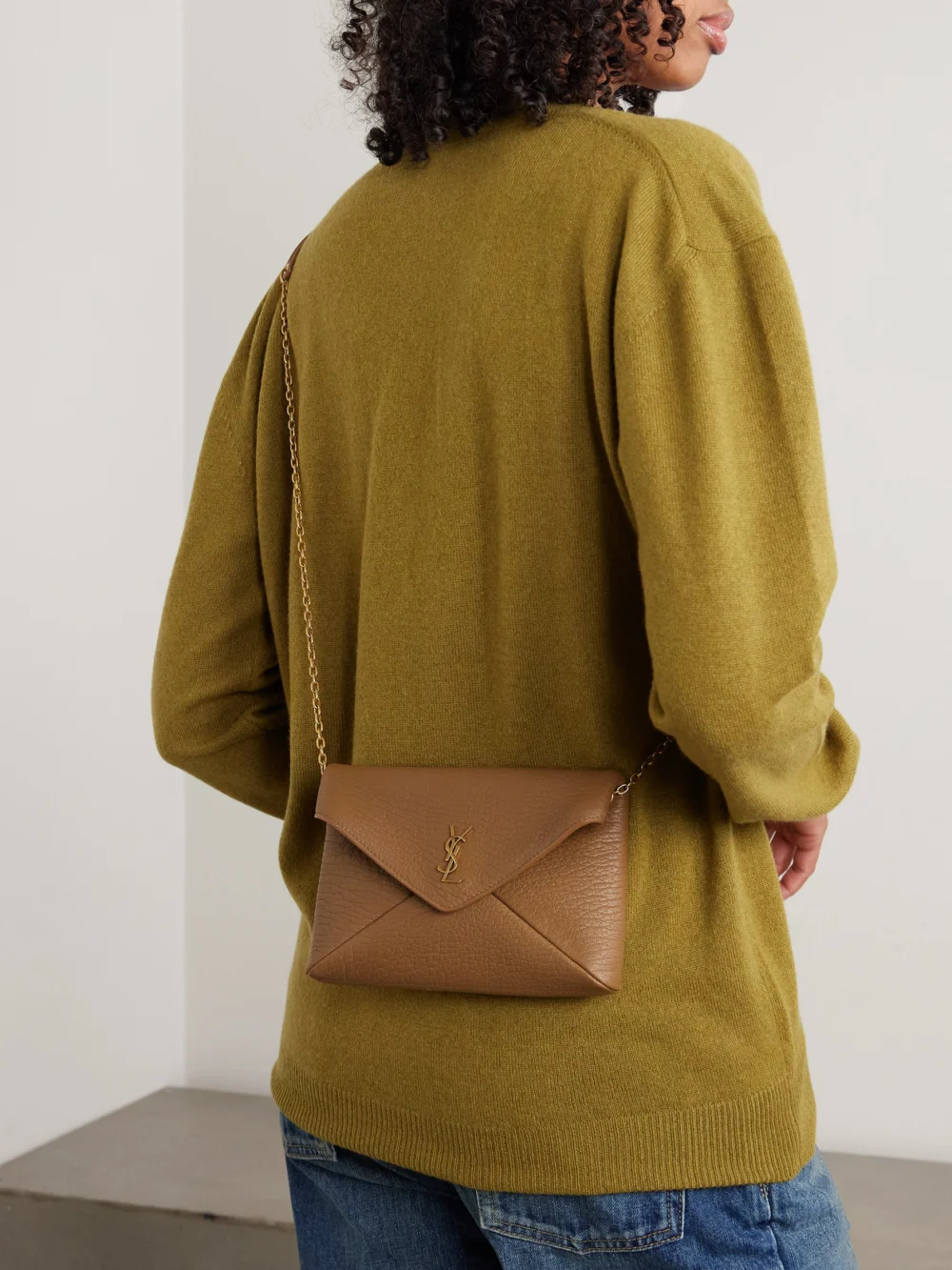 Saint Laurent Cassandre Textured-leather Shoulder Bag, styled view
