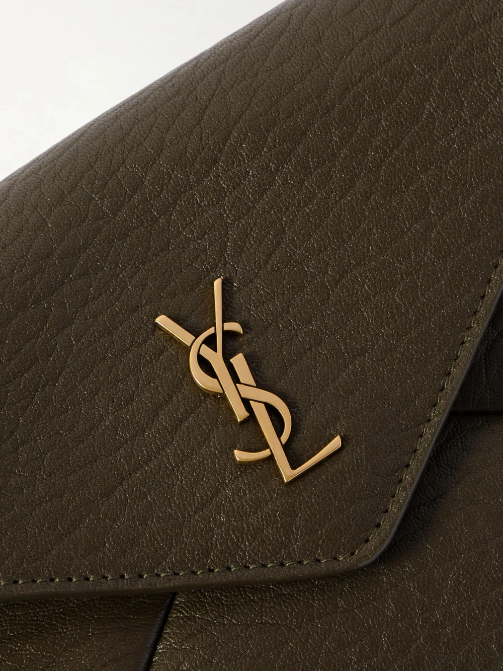 Close-up detail of the Saint Laurent Cassandre Textured-leather Shoulder Bag