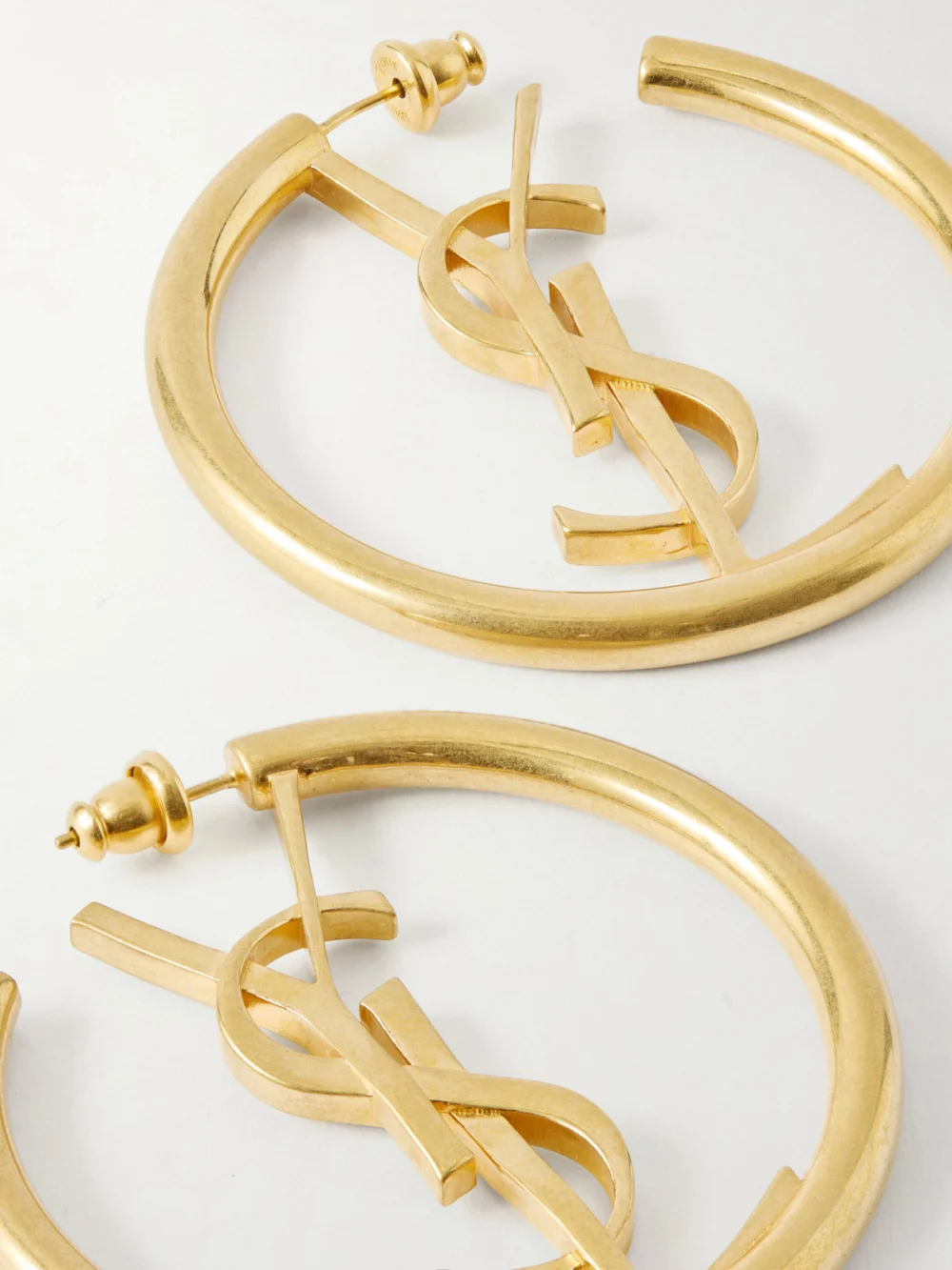 Back view of the Saint Laurent Créoles Cassandre Brass Earrings