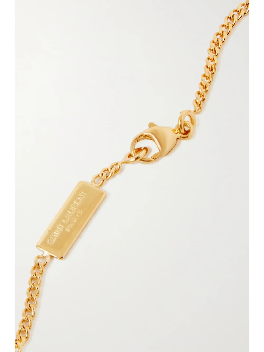Back view of the Saint Laurent Crystal-embellished Gold-tone Bracelet