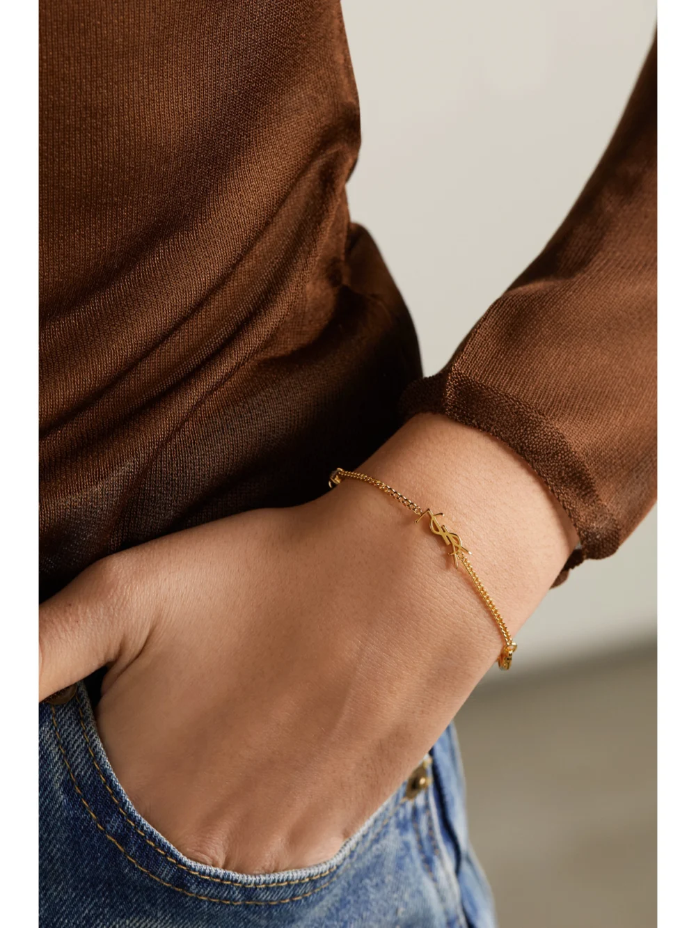 Saint Laurent Crystal-embellished Gold-tone Bracelet, styled view