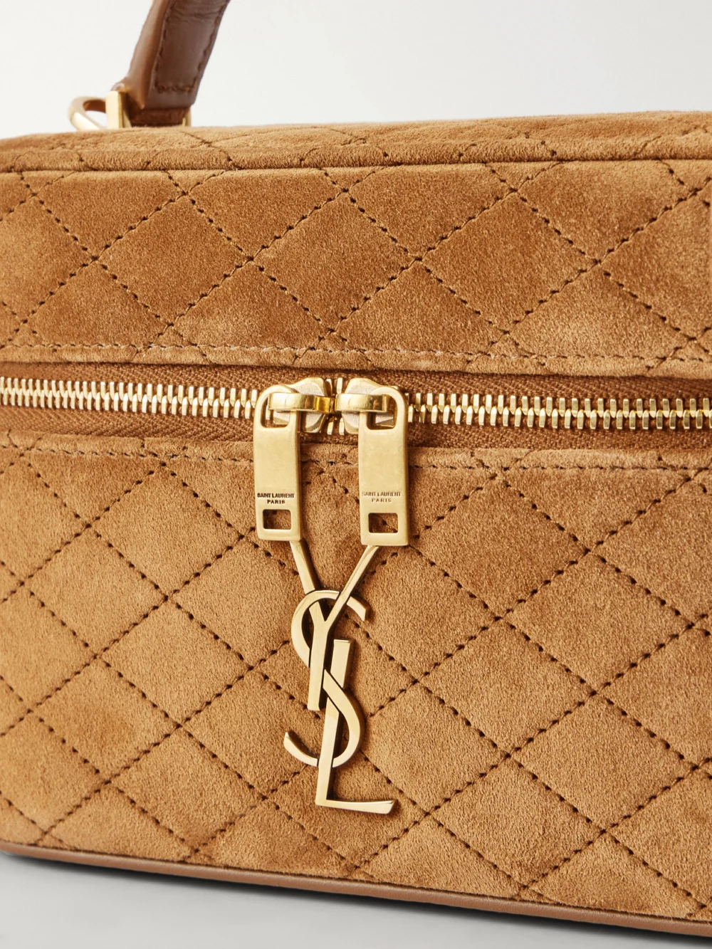 Close-up detail of the Saint Laurent Gaby Cassandre-embellished Matelassé Suede Shoulder Bag