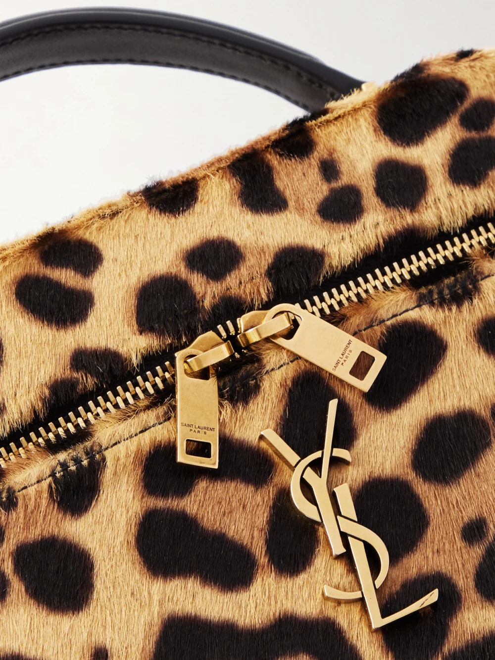 Close-up detail of the Saint Laurent Gaby Vanity Leather-trimmed Leopard-print Calf Hair Shoulder Bag