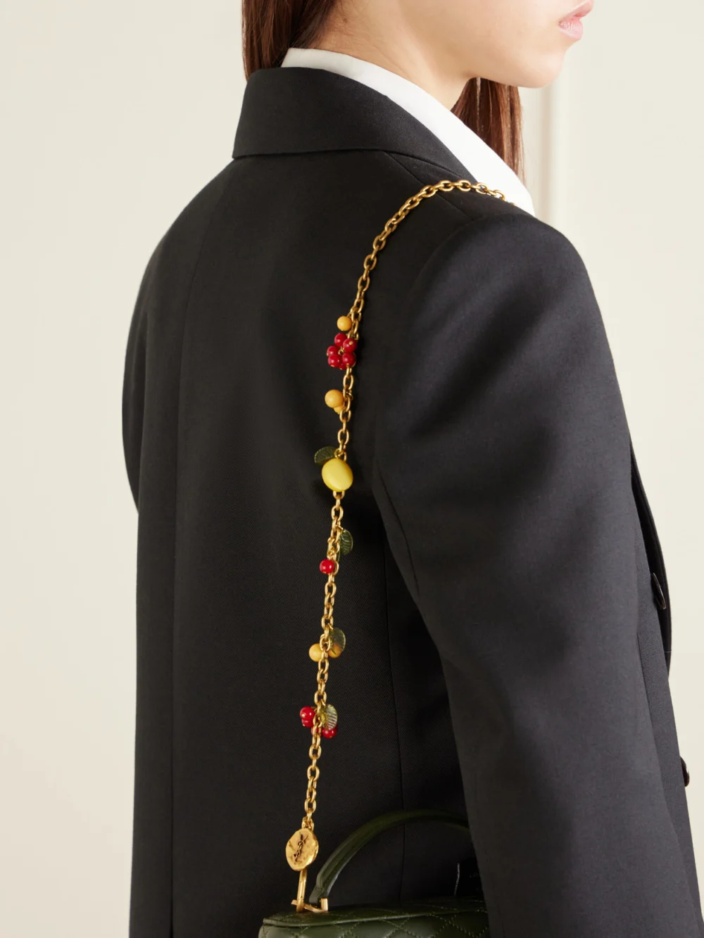 Saint Laurent Gold-tone and Resin Bag Charm, styled view