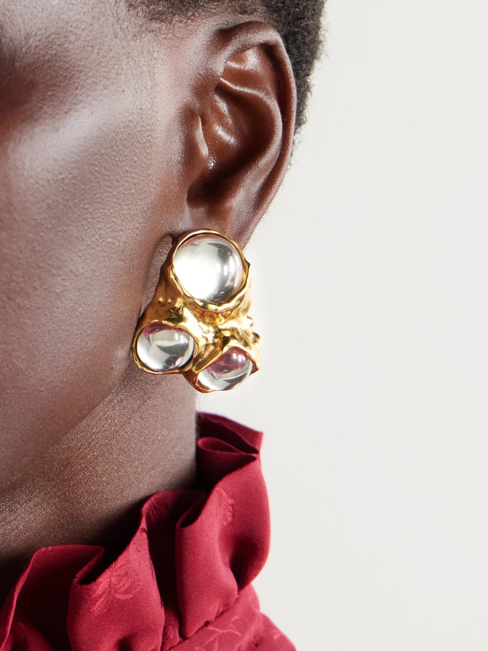 Saint Laurent Gold-tone and Resin Clip Earrings, styled view