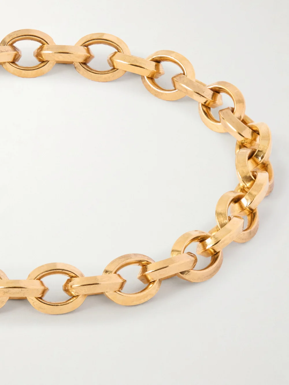Close-up detail of the Saint Laurent Gold-tone Bracelet