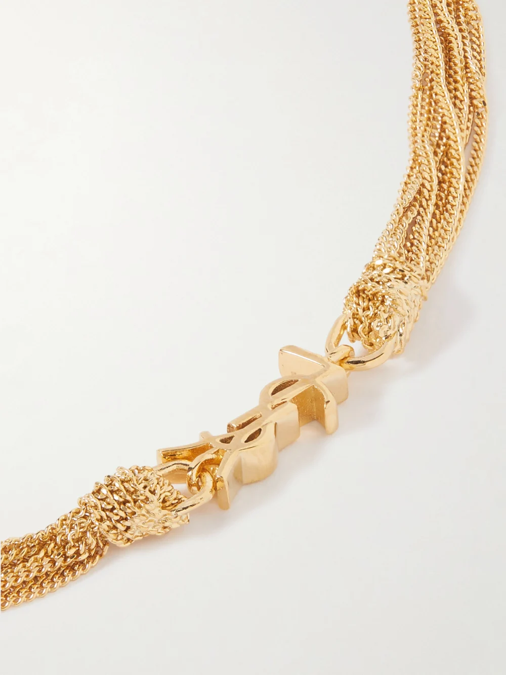 Close-up detail of the Saint Laurent Gold-tone Bracelet