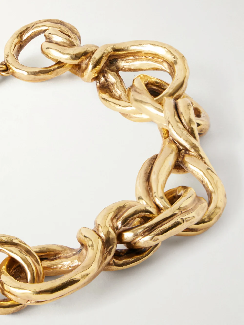 Close-up detail of the Saint Laurent Gold-tone Bracelet