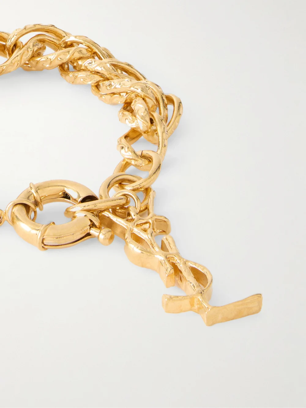 Close-up detail of the Saint Laurent Gold-tone Bracelet