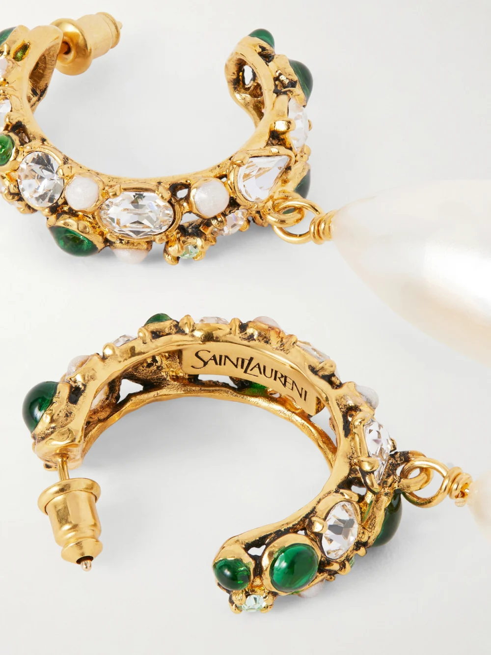 Close-up detail of the Saint Laurent Gold-tone, Crystal and Pearl Hoop Earrings