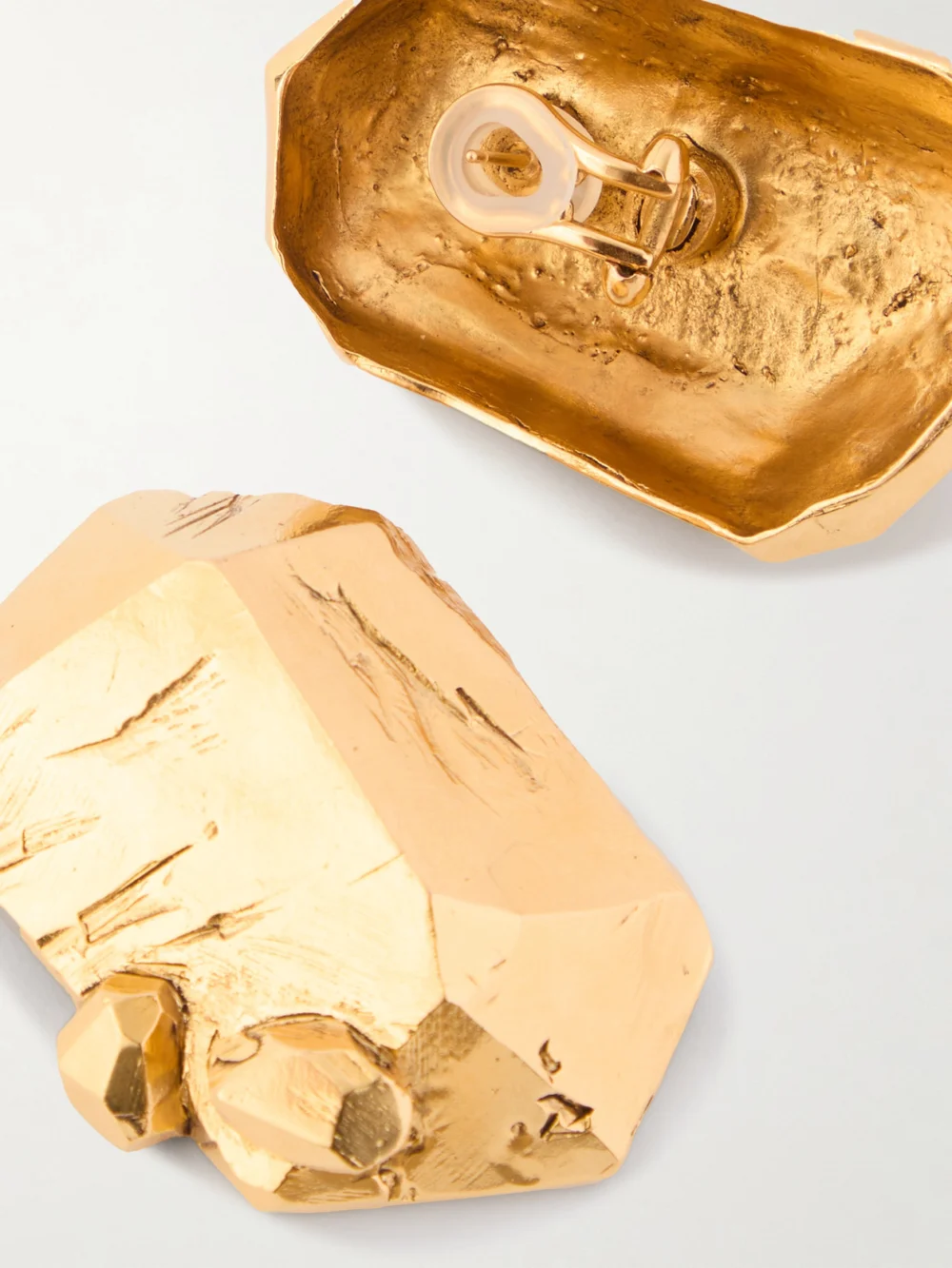 Close-up detail of the Saint Laurent Gold-tone Earrings