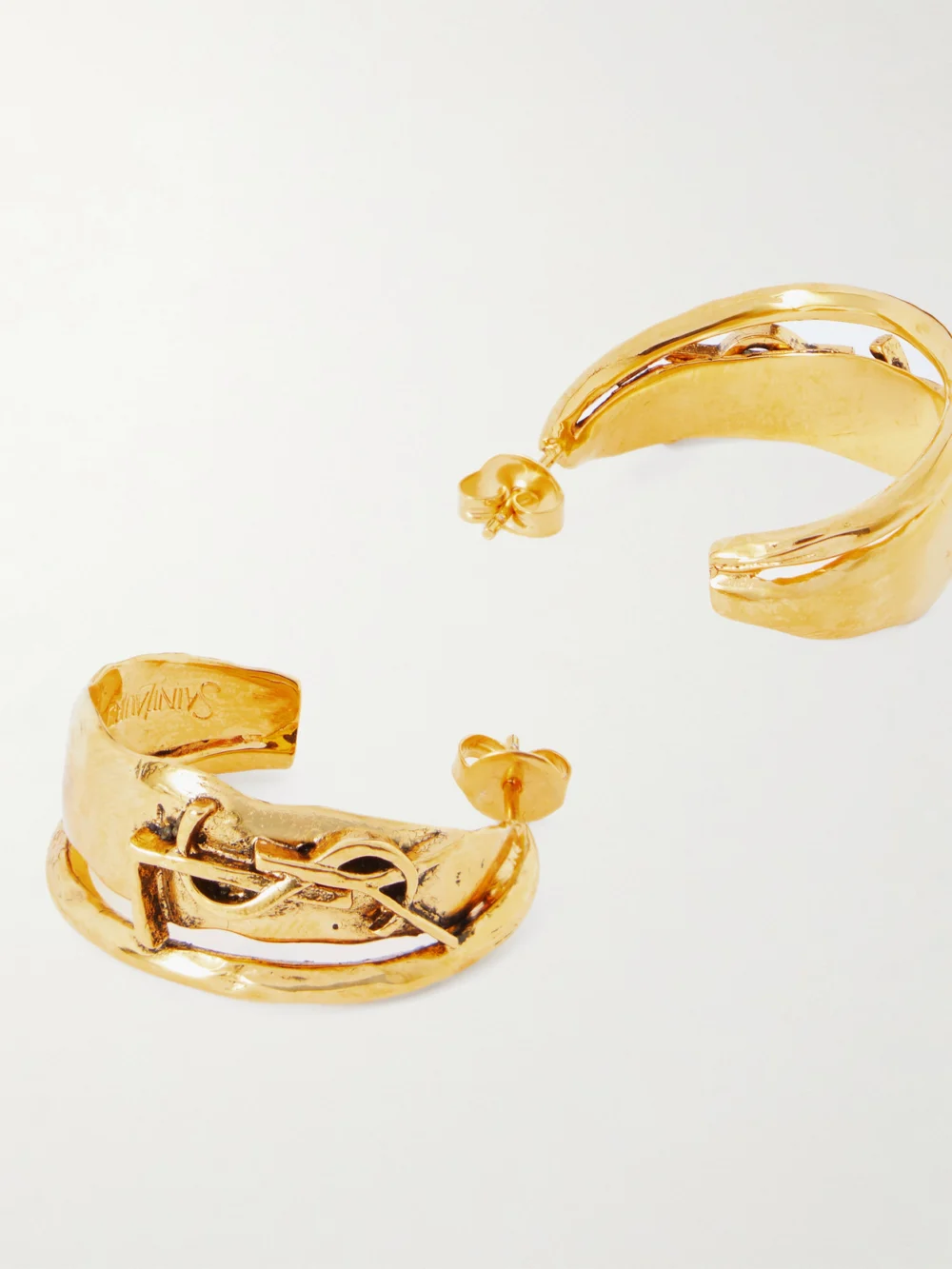 Close-up detail of the Saint Laurent Gold-tone Earrings