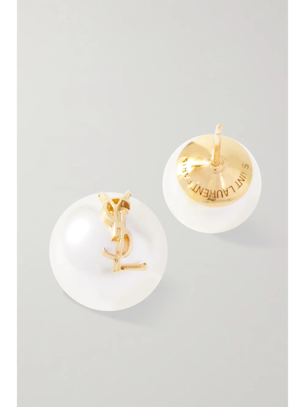Close-up detail of the Saint Laurent Gold-tone Faux Pearl Earrings