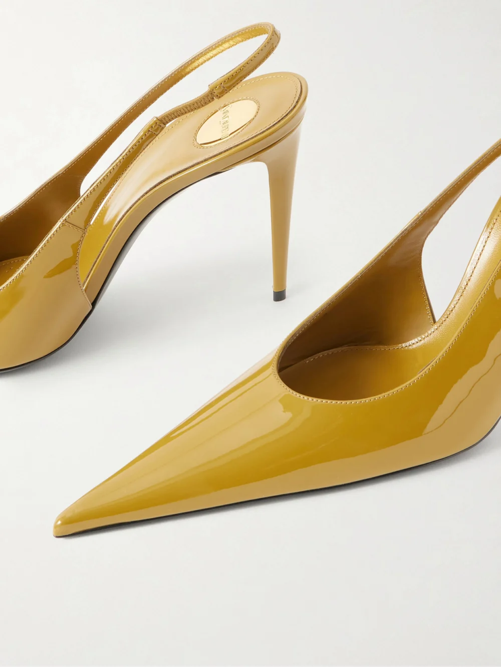 Close-up detail of the Saint Laurent Guermantes 95 Patent-leather Slingback Pumps