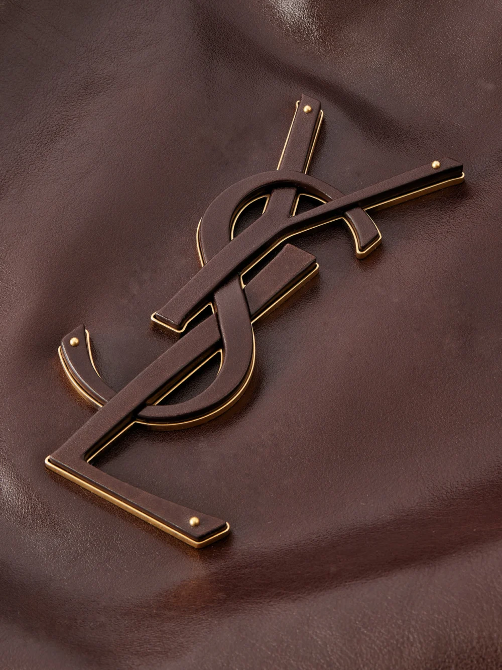 Close-up detail of the Saint Laurent Icare Maxi Suede Tote