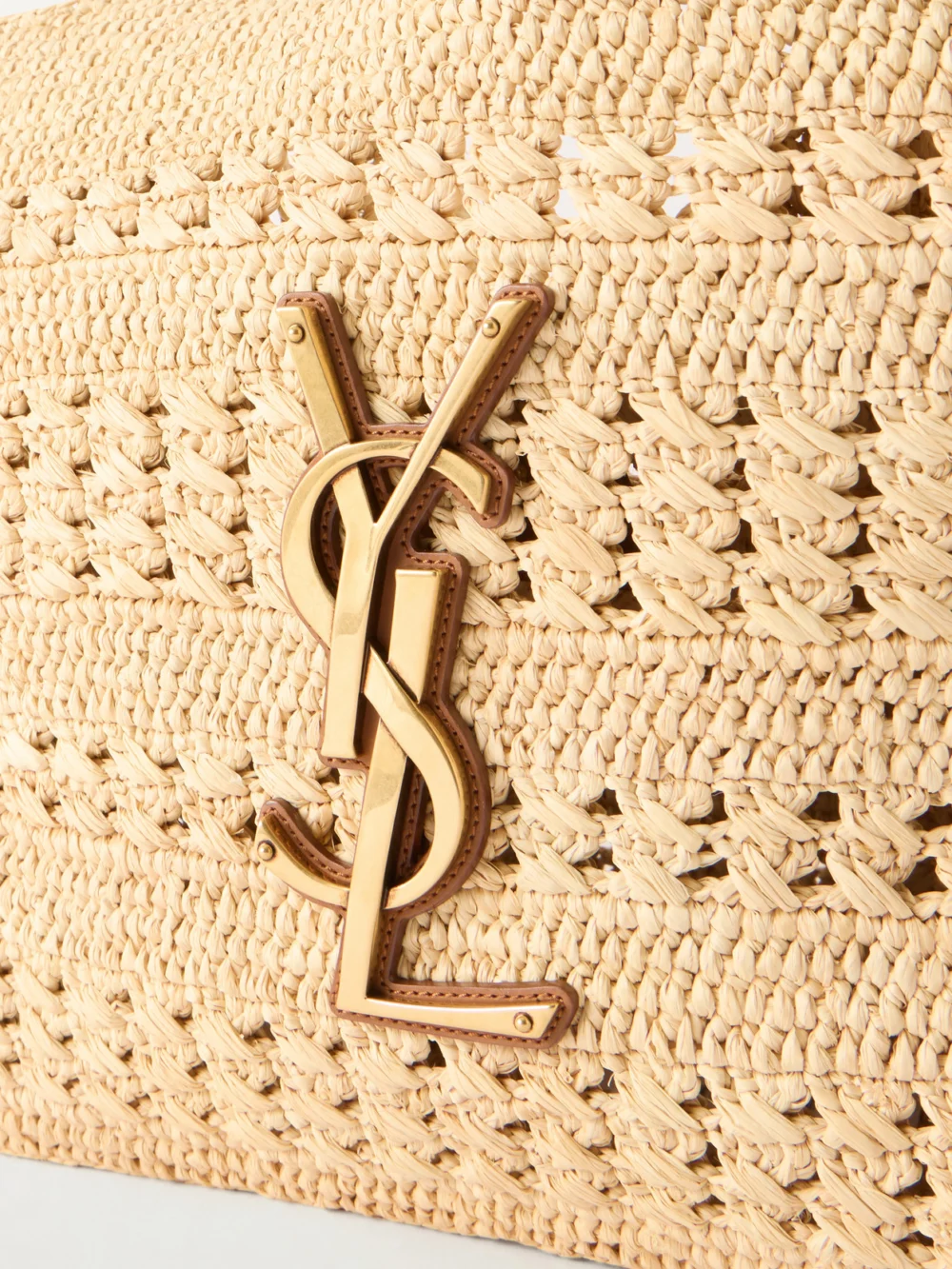 Close-up detail of the Saint Laurent Icare Medium Logo-appliquéd Raffia Tote