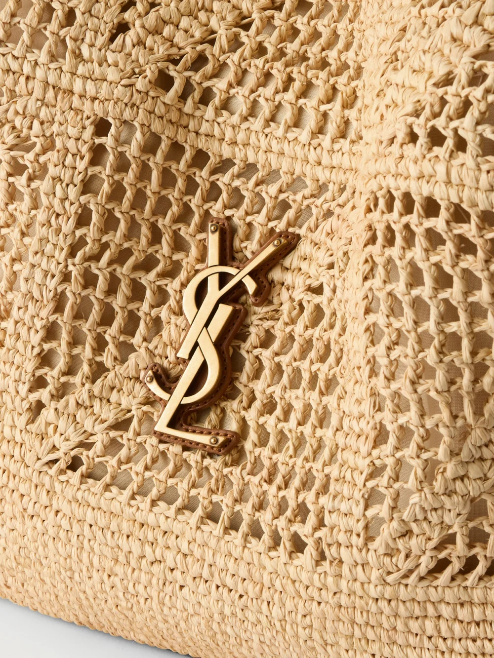 Close-up detail of the Saint Laurent Jamie Shopping Leather-trimmed Raffia Shoulder Bag
