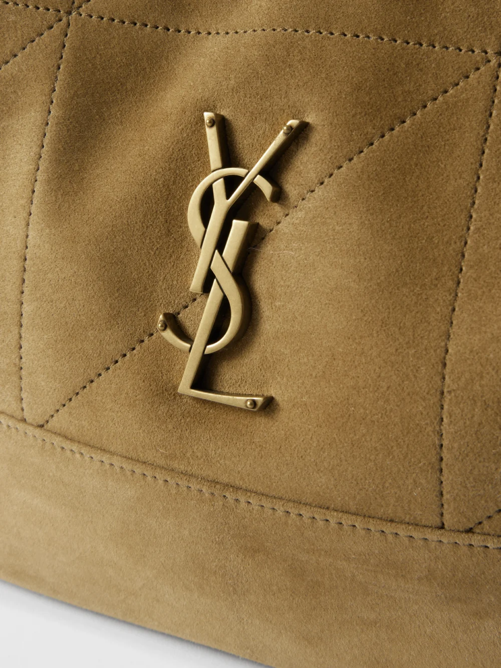Close-up detail of the Saint Laurent Jamie Small Quilted Suede Shoulder Bag