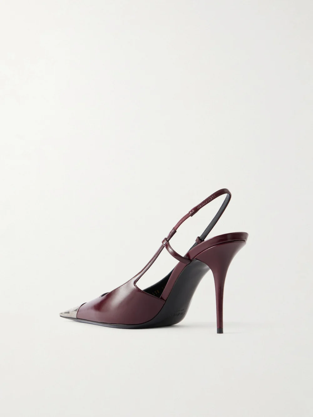 Back view of the Saint Laurent Jeanne Cassandre-embossed Leather Slingback Pumps