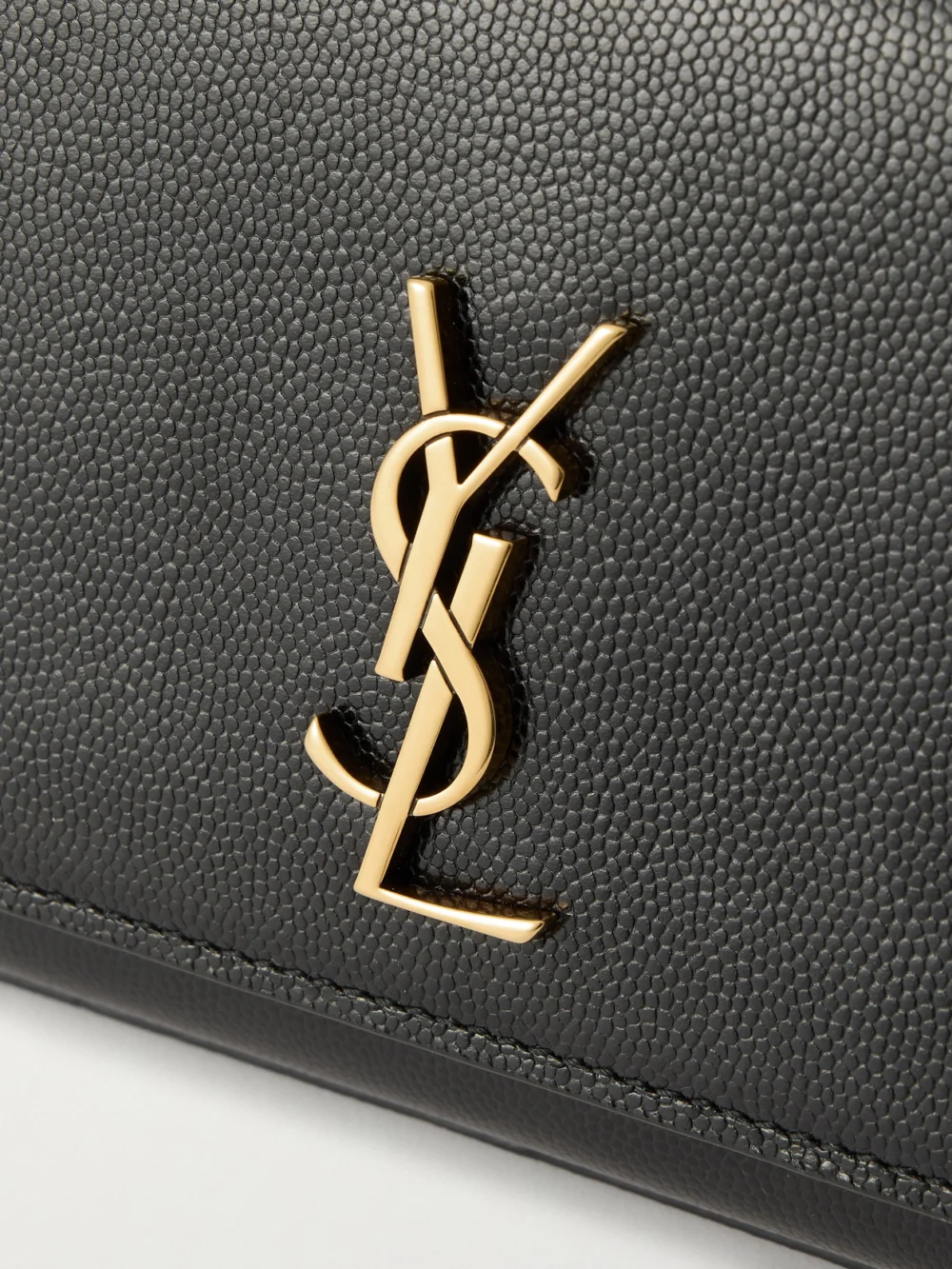 Close-up detail of the Saint Laurent Kate Embossed-leather Clutch