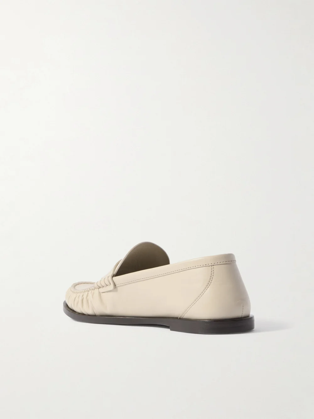 Back view of the Saint Laurent Laurent Cassandre-embellished Glossed-leather Loafers