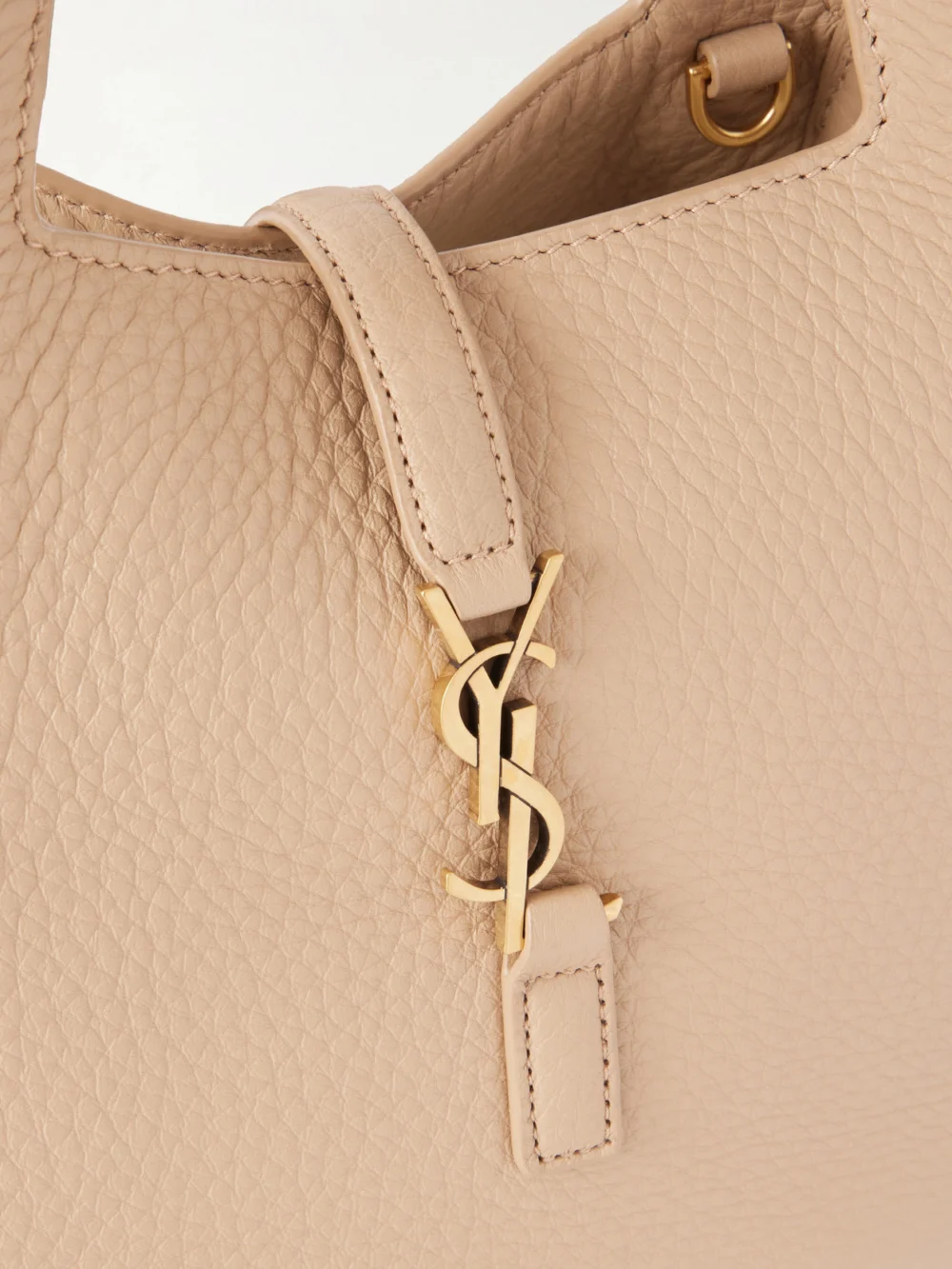 Close-up detail of the Saint Laurent Le 5 À 7 Bea Cassandre-embellished Mini Textured-leather Tote
