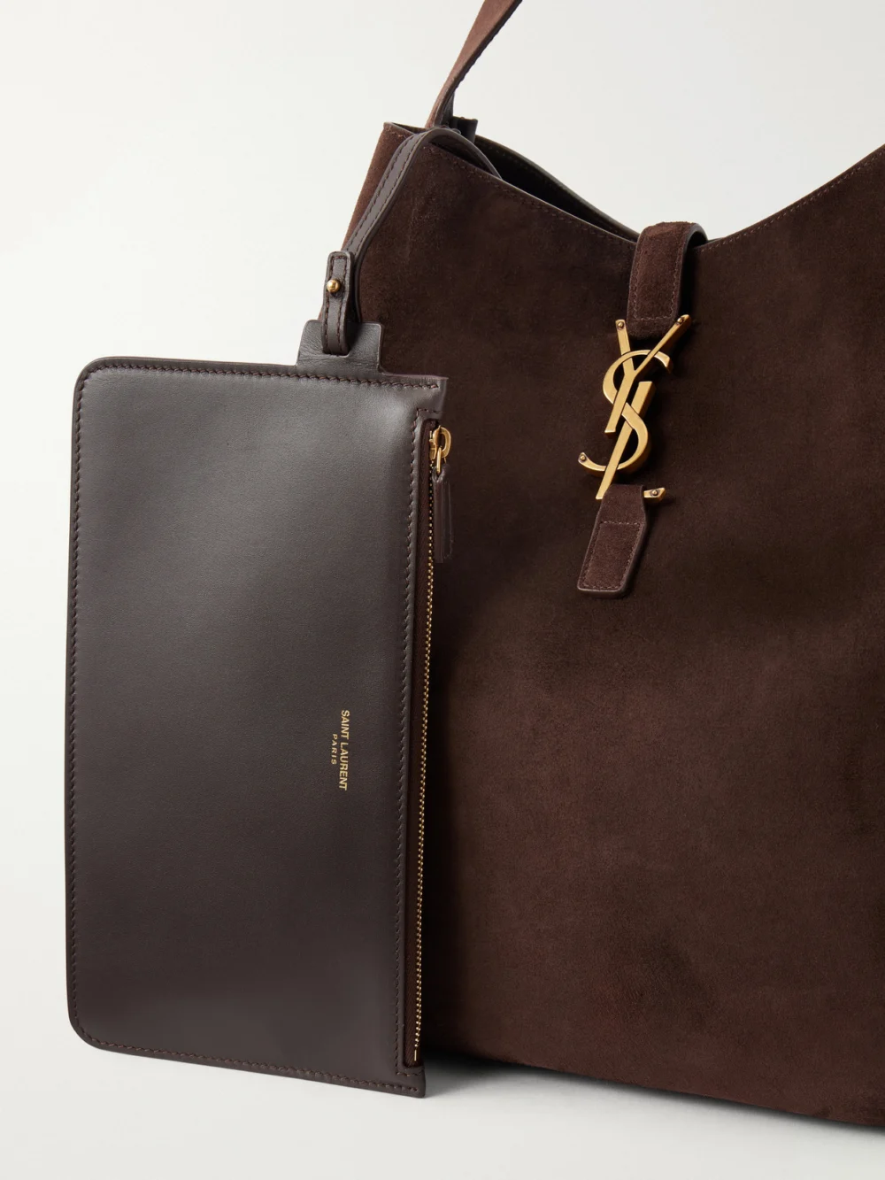 Close-up detail of the Saint Laurent Le 5 À 7 Cassandre-embellished Suede Tote